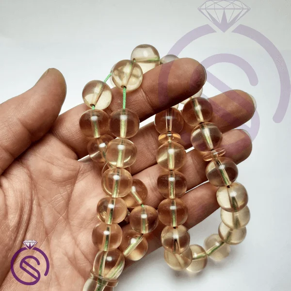 تسبیح سندلوس 33 دانه عسلی شفاف
