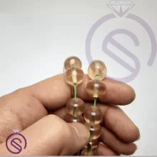 تسبیح سندلوس 33 دانه عسلی شفاف